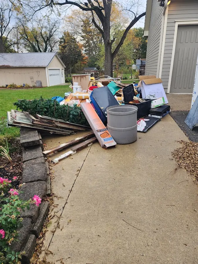 Dumpster being loaded with debris for 30 Yard Dumpster Rental in South Amboy